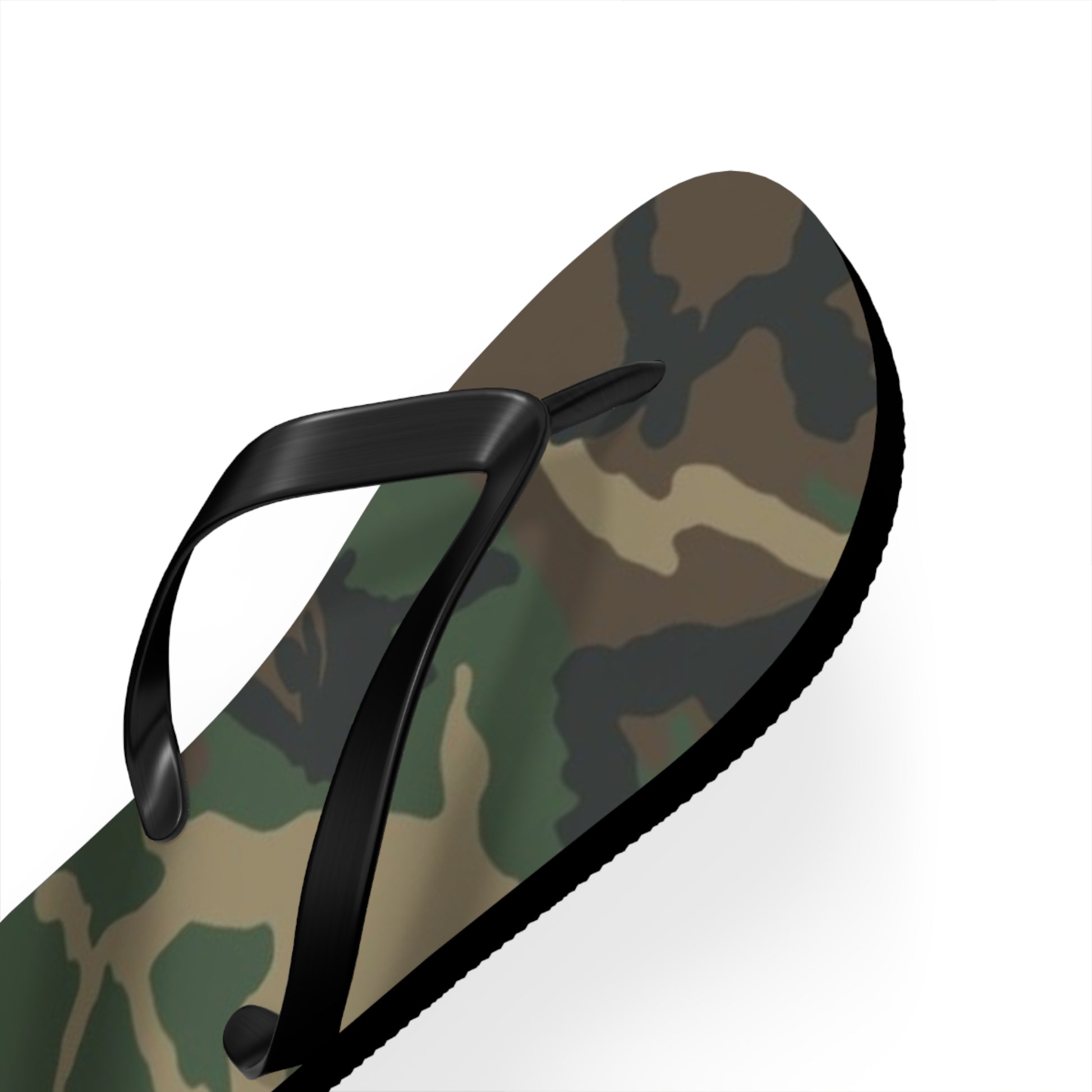 a pair of camouflage flip flops with a black strap